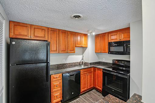 Kitchen with Cabinets at Vista Condominiums, Kansas City