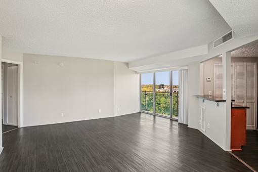 Spacious Empty Room with Wooden Floor at Vista Condominiums, Kansas City