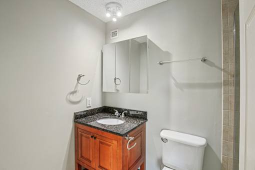 Bathroom with cabinet at Vista Condominiums, Kansas City, 66103