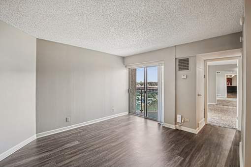 Empty Room with Wooden Floor at Vista Condominiums, Kansas, 66103