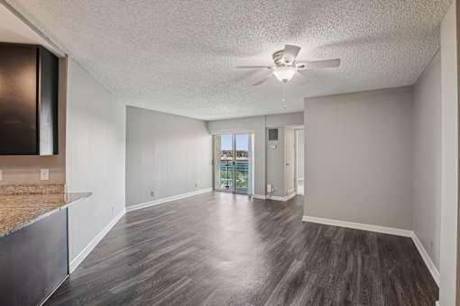 Living Room with Ceiling Fan at Vista Condominiums, Kansas City, KS, 66103