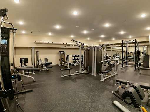 Creekside large gym with a lot of exercise equipment