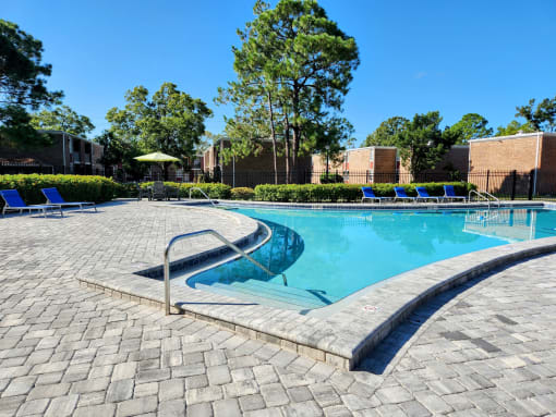 outdoor swimming pool and deck, Timberfalls Apartments