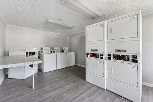 A laundry room with a washer and dryer.