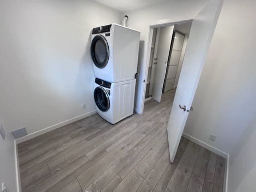 a washer and dryer in a small room