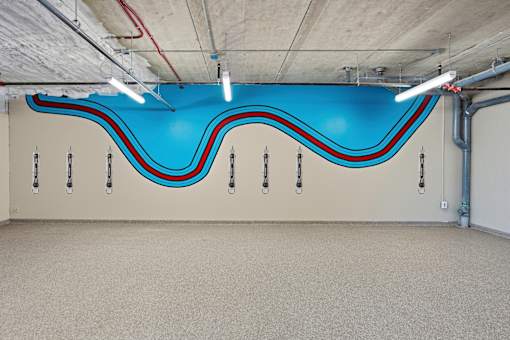 A wall with a blue and red design on it.