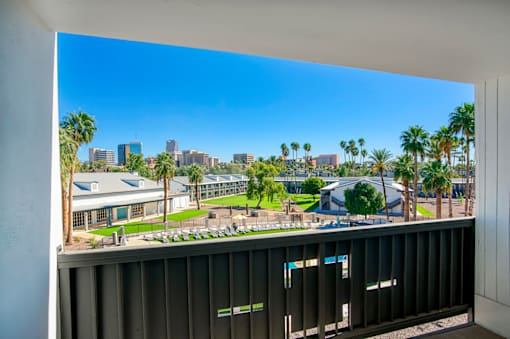 A view of a city skyline from a balcony at Presidio Palms Apartments, Arizona
