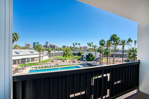 Balcony overlooking the pool areaat Presidio Palms Apartments, Arizona