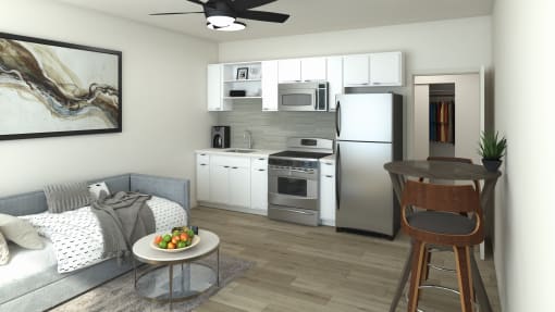 a small living room with a couch and a table at Presidio Palms Apartments, Arizona, 85701