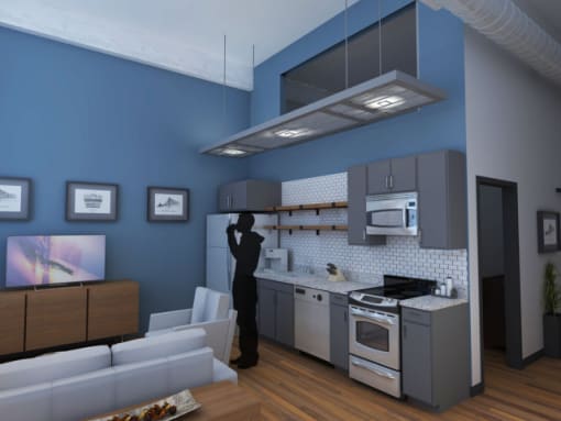 a person is taking a picture of a kitchen at American Spinning Mill, Greenville, SC