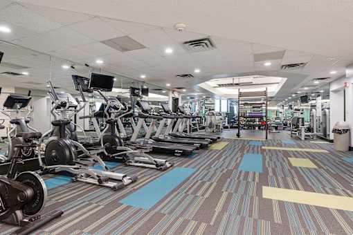 fitness center with cardio equipment