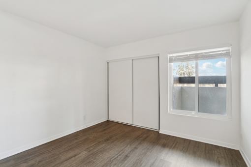 bedroom with sliding closet doors