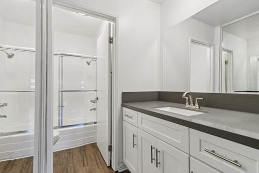 A sink and mirror in a bathroom