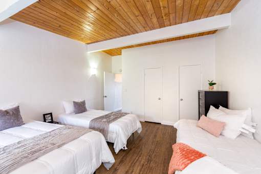 A furnished bedroom at The Wave