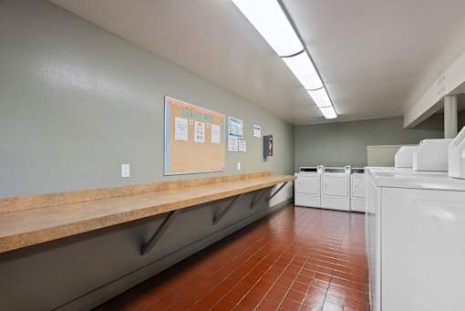 A laundry room with folding area at Tahitian
