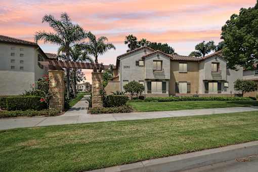 Exterior view of Villas at the park at sunset