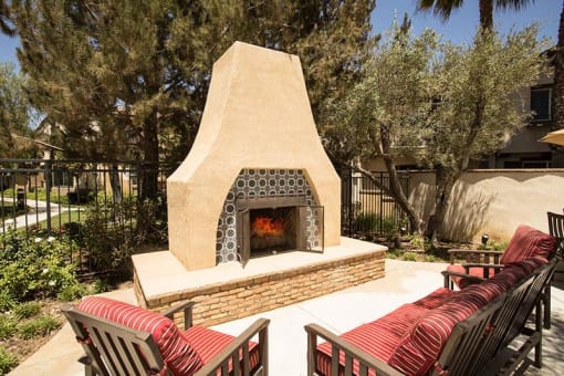 a fire place and patio area outside