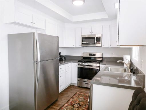 kitchen with white cabinets and stainless steel appliances
