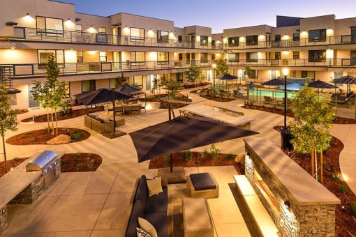 courtyard with view of firepit and BBQ grill area