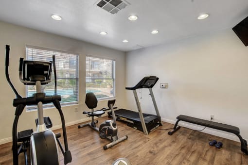 the fitness center at Versailles Senior Apartments
