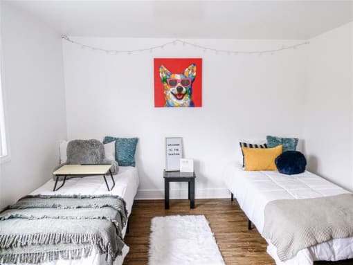 a bedroom with two beds