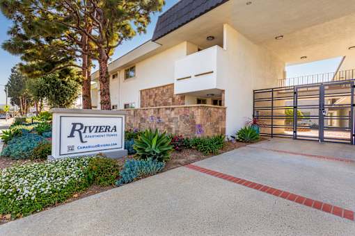 The front of Riviera Apartments