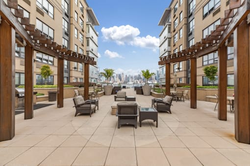 Patio with tables and chairs at RiversEdge, New Jersey