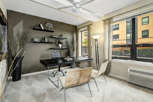Room with desk and chair at RiversEdge, Weehawken, NJ, 07086