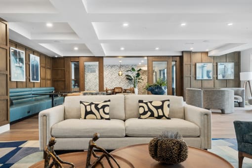 a living room with a couch and a table
