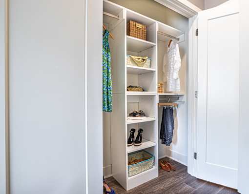 Organized closet with shelving and hanging storage at Inwood at Renaissance Square Apartments, New Jersey, 08053