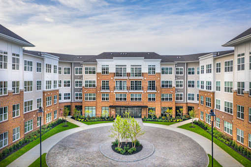Courtyard with circular driveway and central landscaping at Inwood at Renaissance Square Apartments, Marlton, 08053