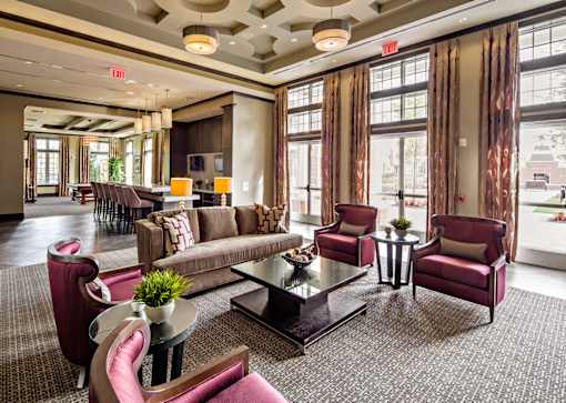 Clubhouse lounge with decorative ceiling and tall windows at Highlands at Hilltop Apartments, New Jersey, 07044