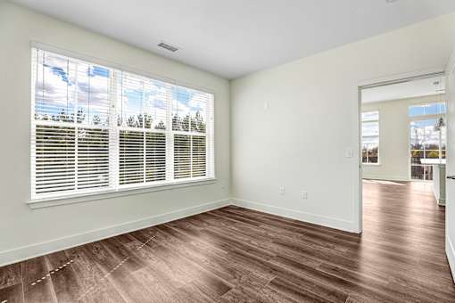 Empty room with large window and horizontal blinds at Inwood at Renaissance Square Apartments, Marlton, NJ 08053