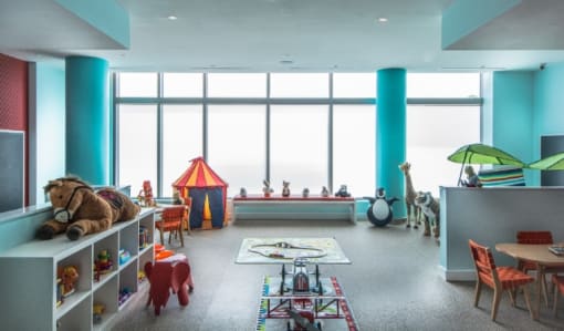 Colorful childrens playroom with large windows at RiverParc Apartments, Weehawken, New Jersey