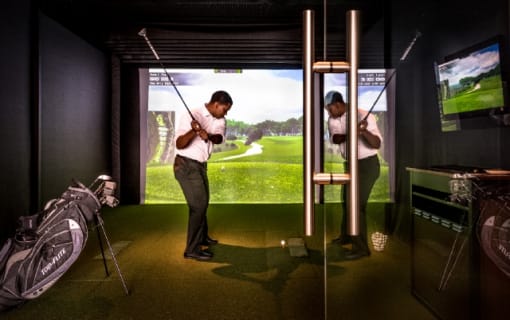 Golf simulator with virtual course display at RiverParc Apartments, Weehawken, NJ