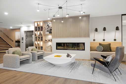 Living room with fireplace at The Lawrence, Parsippany, 07054
