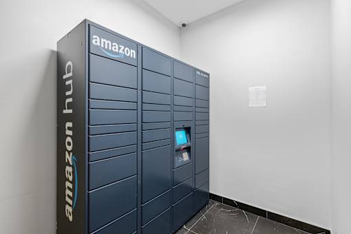 A tall Amazon storage unit stands in a white room.