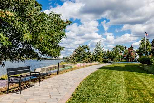 Park with bench and lawn area at The Waverton, Secaucus, 07094