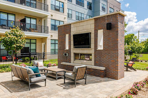 Outdoor patio with fireplace at The Waverton, Secaucus, New Jersey