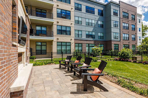 Patio with row of black chairs at The Waverton, Secaucus, 07094