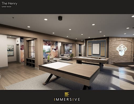 A modern game room with a large table and a TV on the wall.