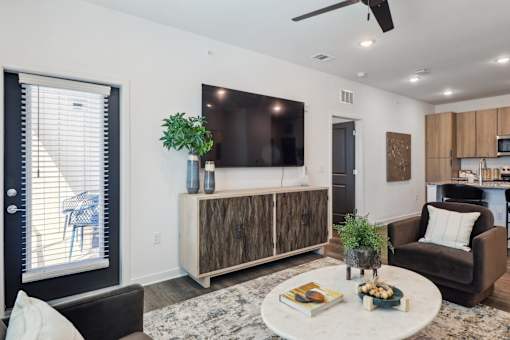 Living Area With Kitchen at The Liliana Apartment Homes, Pooler Georgia