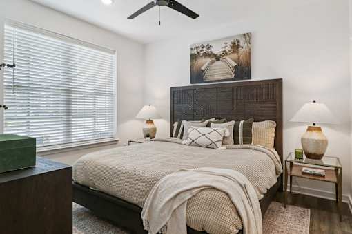 Bedroom With Expansive Windows at The Liliana Apartment Homes, Pooler, GA