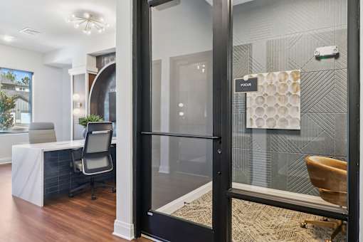 A bathroom with a glass shower at The Liliana Apartment Homes, Pooler, 31322