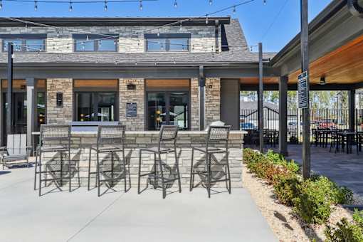Outdoor Grill And Patio at The Liliana Apartment Homes, Georgia, 31322