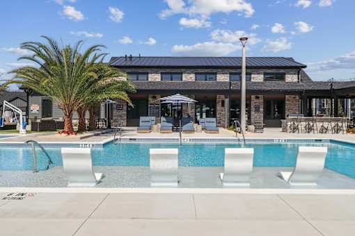 Pool With Sundecks at The Liliana Apartment Homes, Pooler