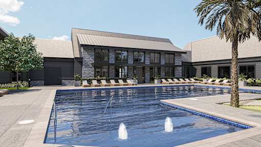 A large swimming pool in front of a building with a palm tree to the side at The Pullman Luxury Apartment Homes, Atlanta, GA
