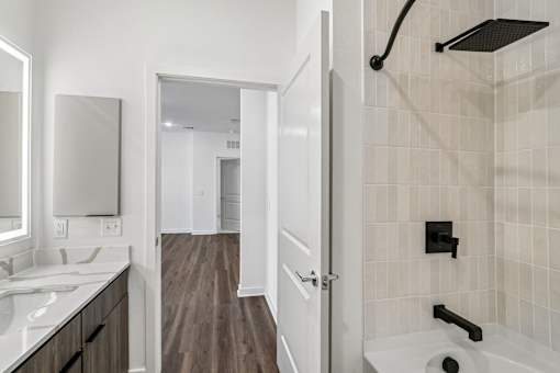 Bathroom with tiled shower and dual vanity at Velara Luxury Apartments, Ponte Vedra Beach, 32081