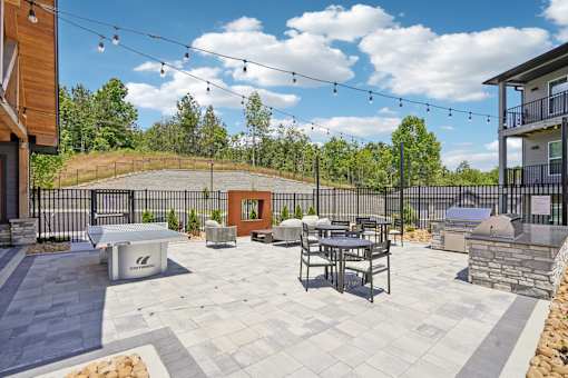 Grill And Patio at The Pullman Luxury Apartments, Atlanta, 30349