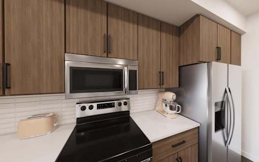Kitchen with cabinets at The Union Flats at Fishers District, Fishers, IN